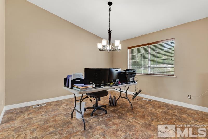 13755 Rancheros Drive Reno, NV 89521 - Photo 17 of 24 a workspace with furniture and a window