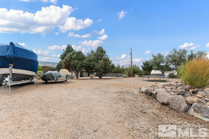 13755 Rancheros Drive Reno, NV 89521 - Photo 21 of 24 a view of a backyard