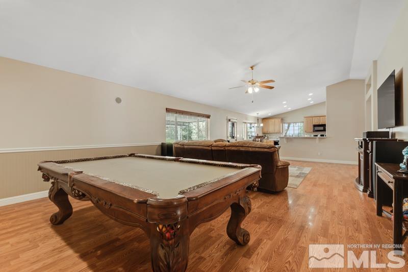 13755 Rancheros Drive Reno, NV 89521 - Photo 8 of 24 a room with pool table and flat screen tv