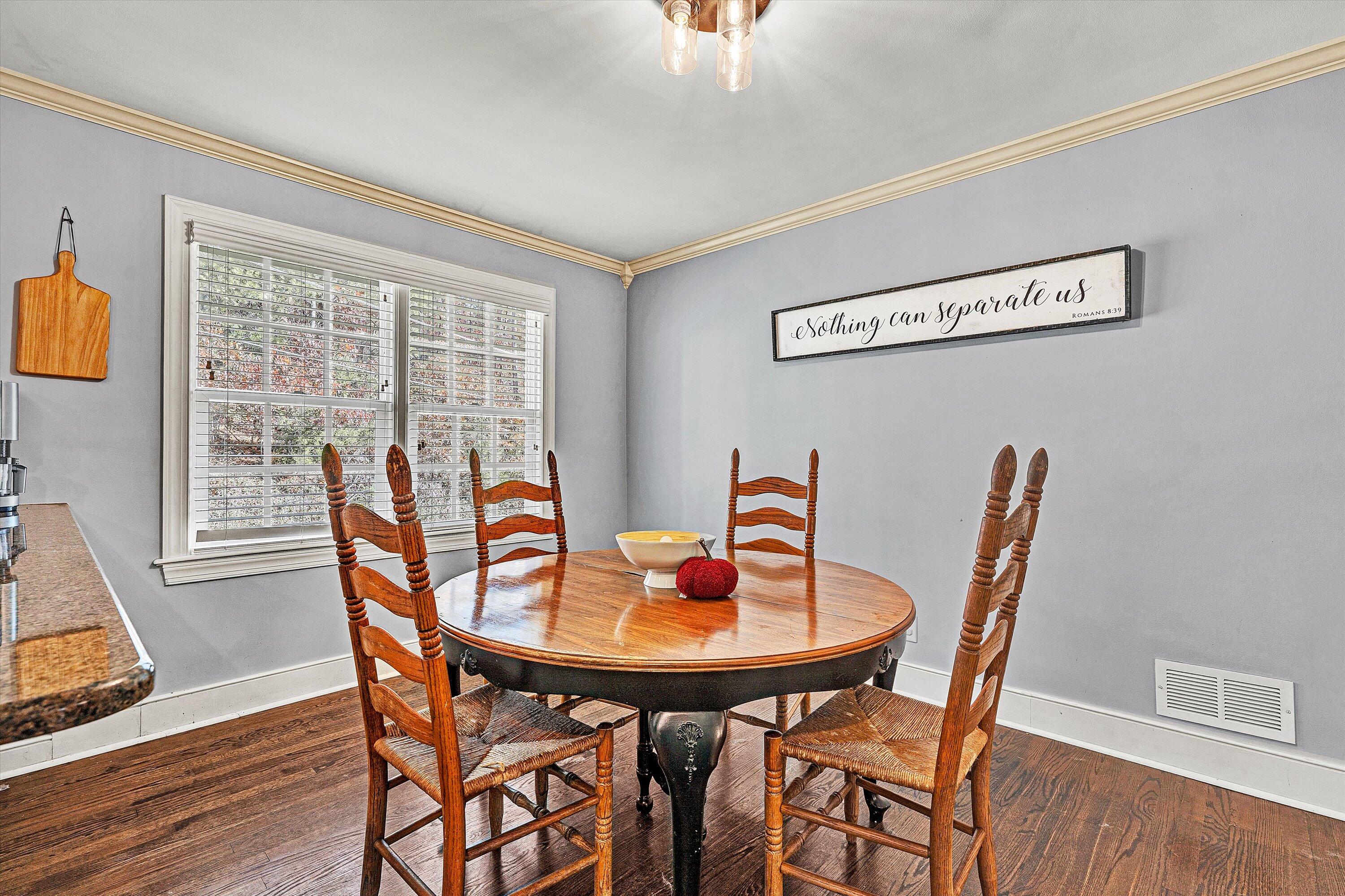 2320 Grassy Hill Road Rocky Mount, VA 24151 - Photo 13 of 57 a view of a dining room with furniture and wooden floor