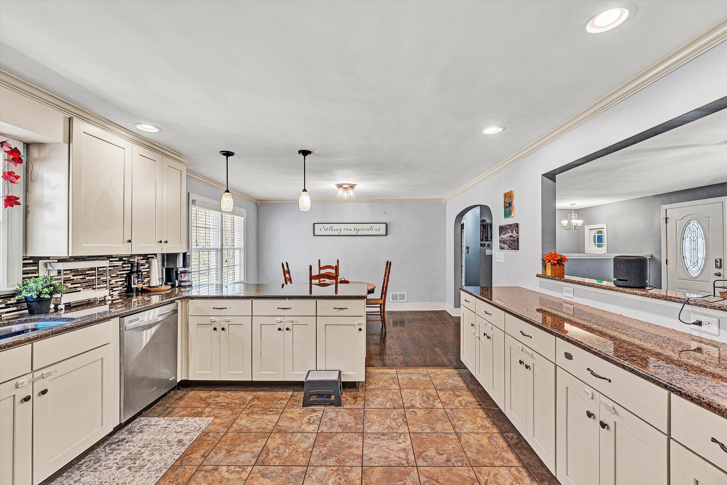 2320 Grassy Hill Road Rocky Mount, VA 24151 - Photo 17 of 57 a large white kitchen with a sink and cabinets