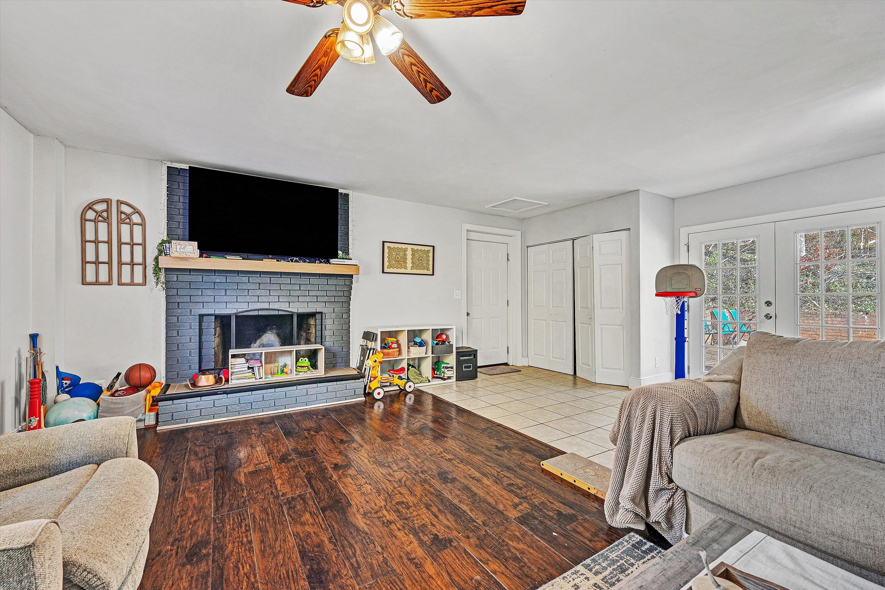 2320 Grassy Hill Road Rocky Mount, VA 24151 - Photo 23 of 57 a living room with furniture and a fireplace