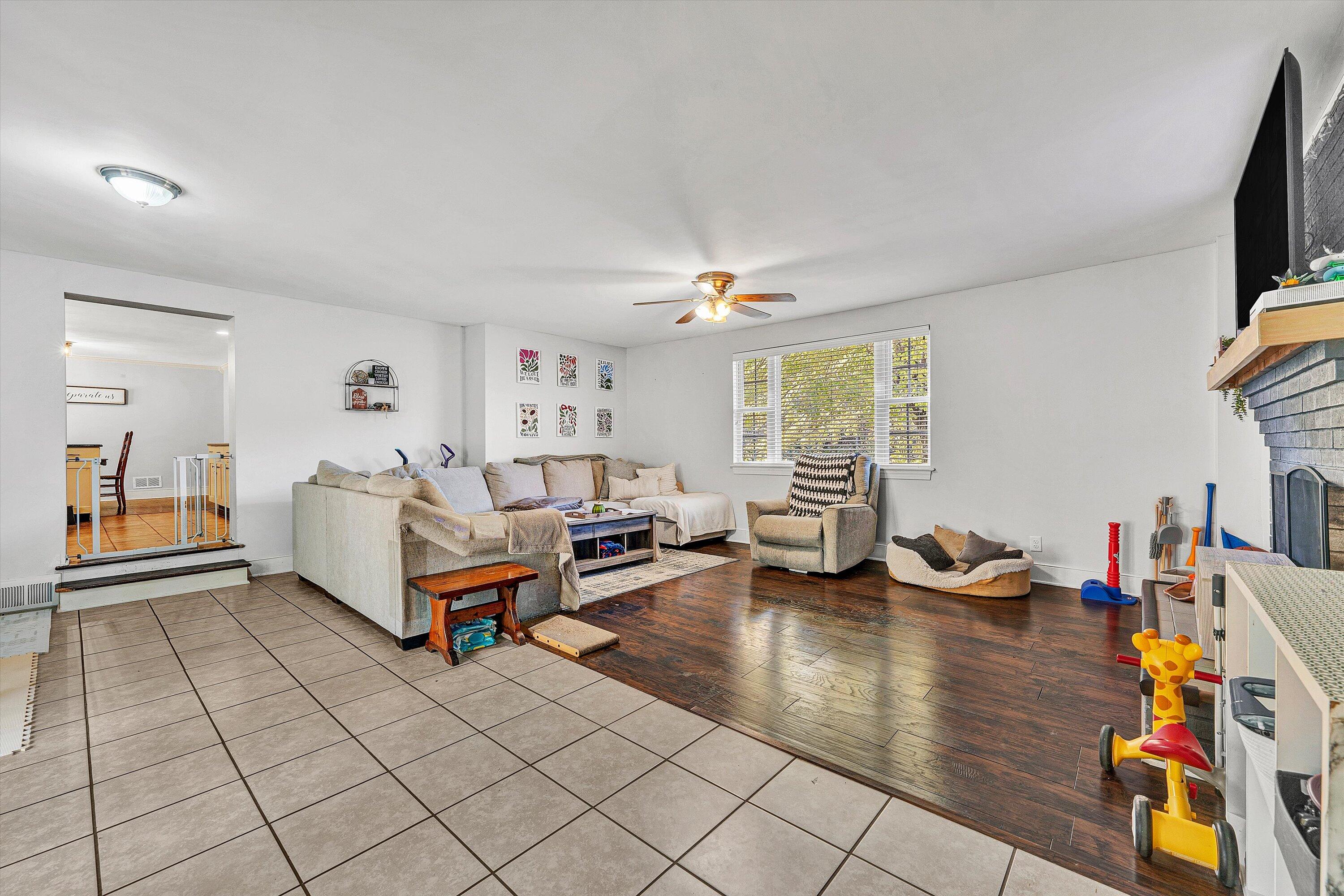 2320 Grassy Hill Road Rocky Mount, VA 24151 - Photo 25 of 57 a living room with furniture and a flat screen tv