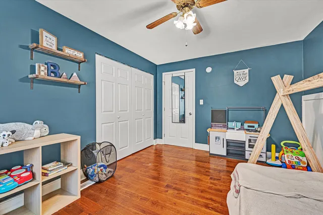 a bathroom with a granite countertop sink a mirror and a