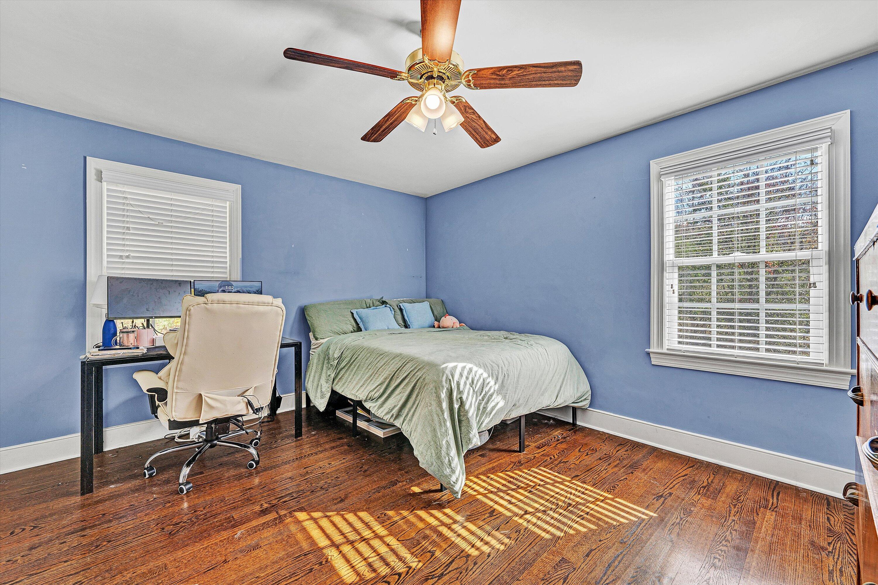 2320 Grassy Hill Road Rocky Mount, VA 24151 - Photo 35 of 57 a bedroom with a large bed and a desk