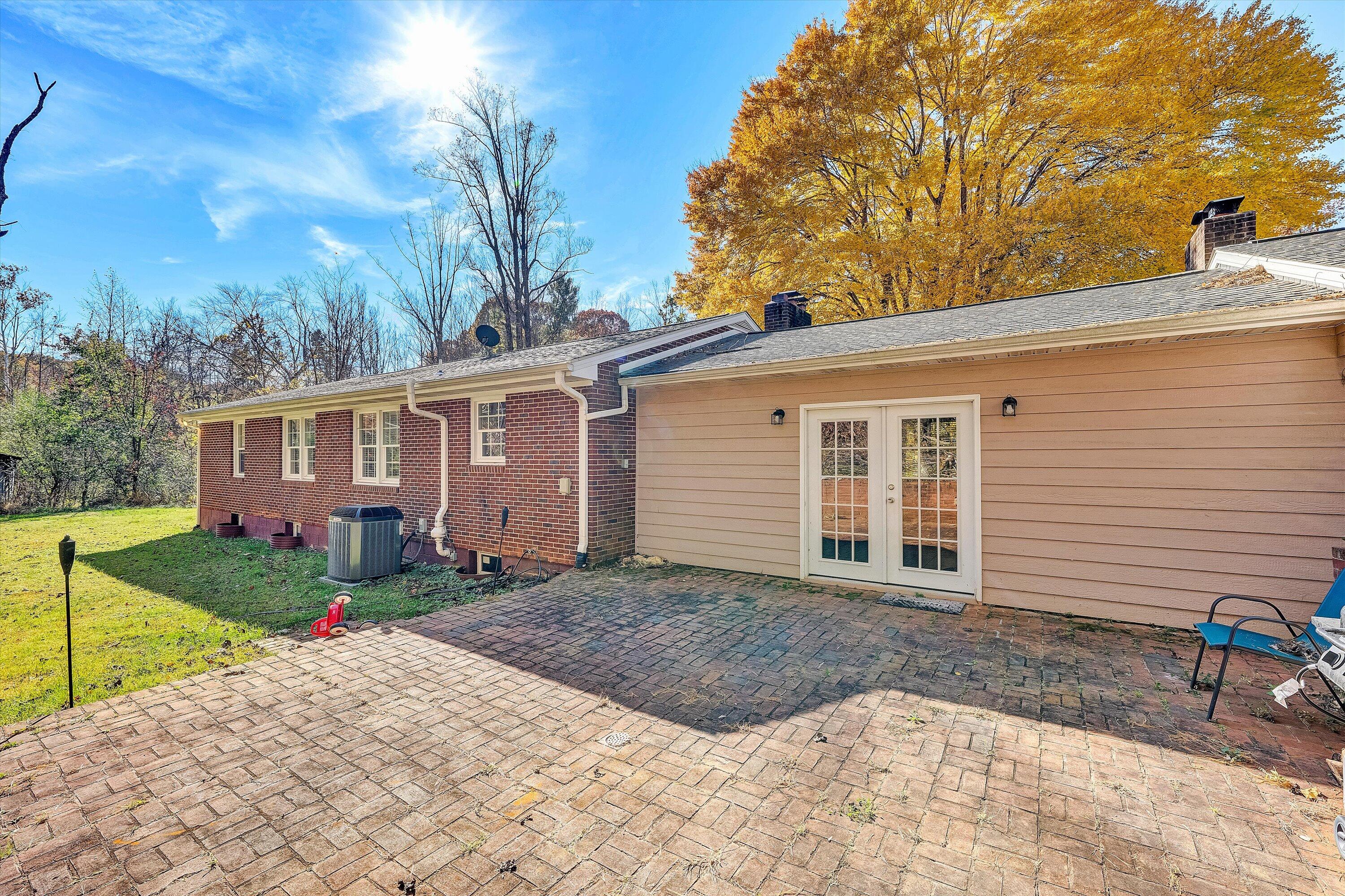 2320 Grassy Hill Road Rocky Mount, VA 24151 - Photo 43 of 57 a view of a house with backyard and sitting area