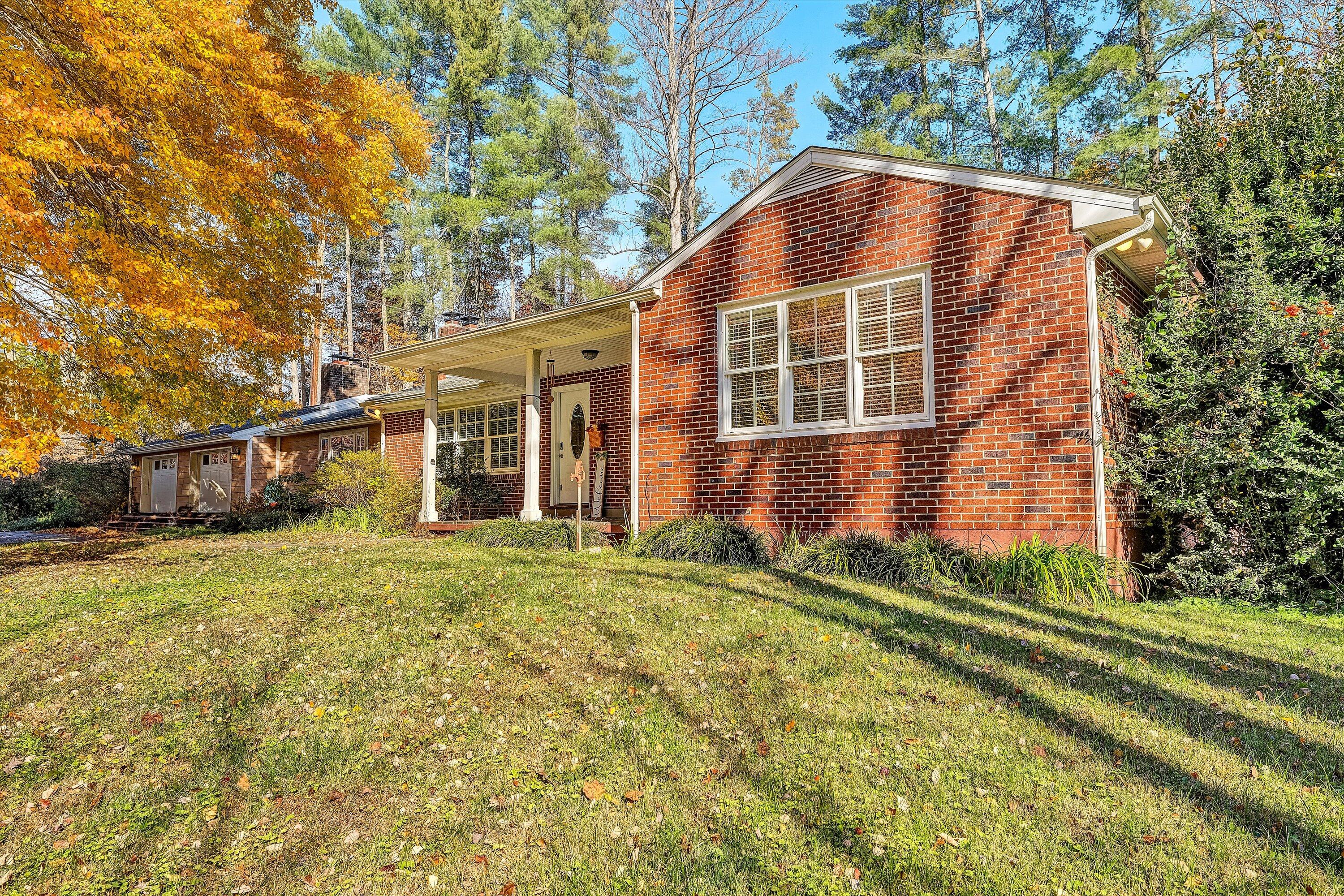2320 Grassy Hill Road Rocky Mount, VA 24151 - Photo 45 of 57 a front view of a house with a yard