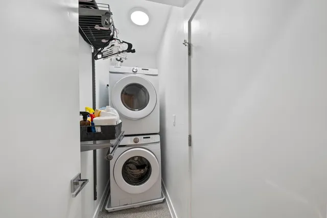 a view of a closet with storage