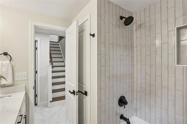 a view of a bathroom with a shower