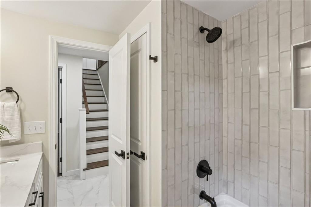 2152 Edgemore Drive Southeast Atlanta, GA 30316 - Photo 23 of 33 a view of a bathroom with a shower