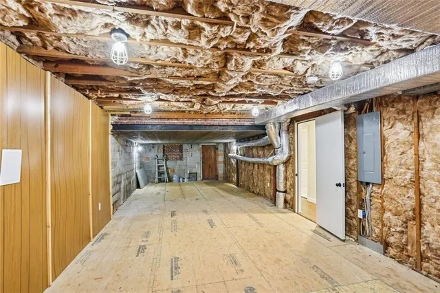 a view of hallway with furniture