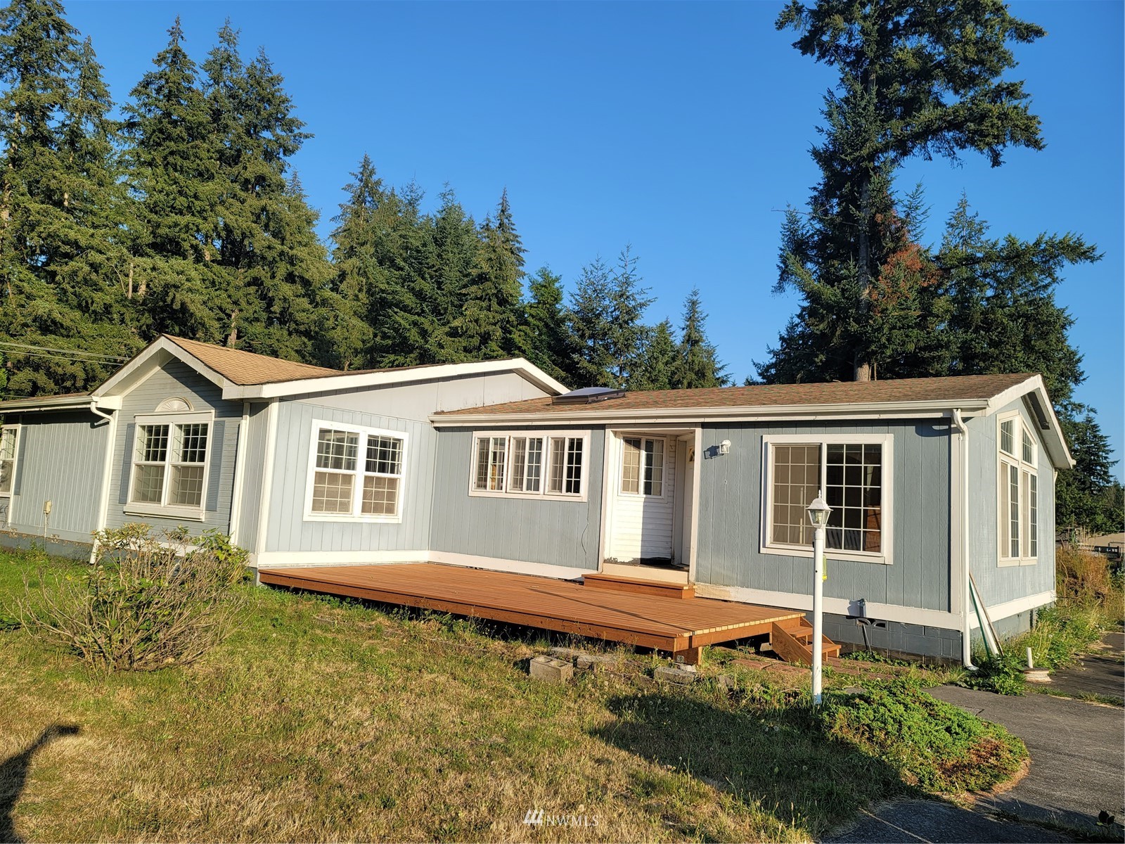 a house with trees in the background