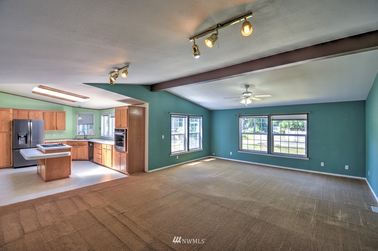 17327 Sargent Road Southwest Rochester, WA 98579 - Photo 3 of 23 a view of an empty room and window