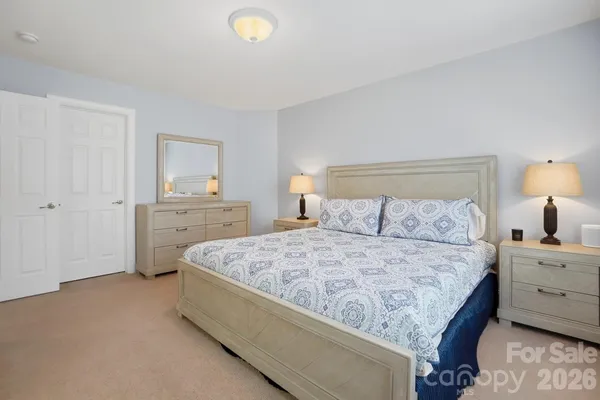 a bathroom with a sink double vanity and a mirror
