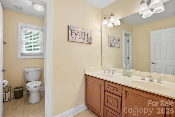 a white bath tub and a shower