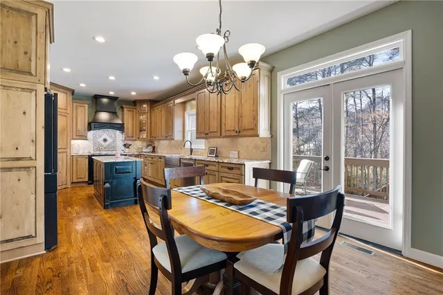 a bathroom with a sink vanity and a mirror