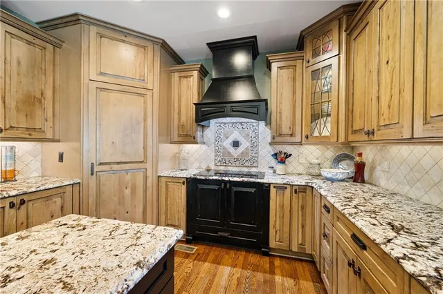 a bathroom with a sink vanity and mirror