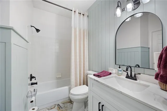 a utility room with a sink a washer and dryer
