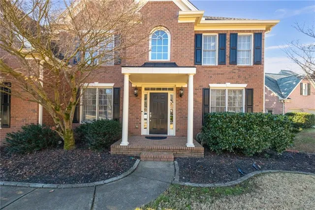 a view of entryway dining room and hall with wooden floor