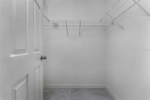 a view of a room with racks on the wall