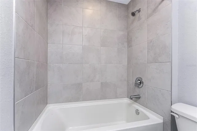 a bathroom with a bathtub