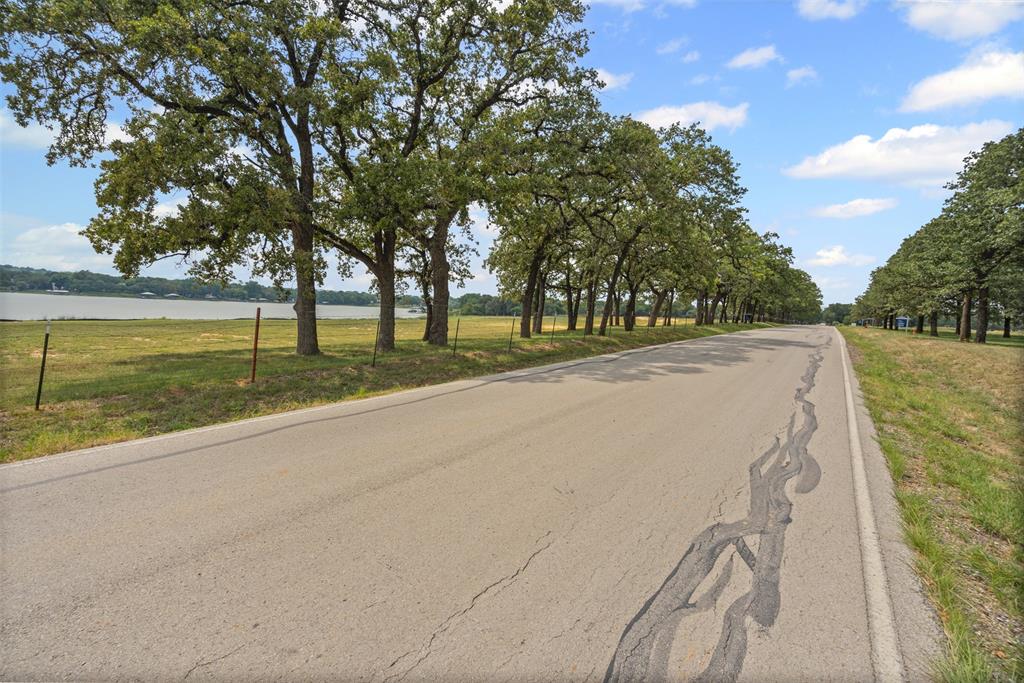 1508 Park Street Azle, TX 76020 - Photo 17 of 18 a view of a park with large trees