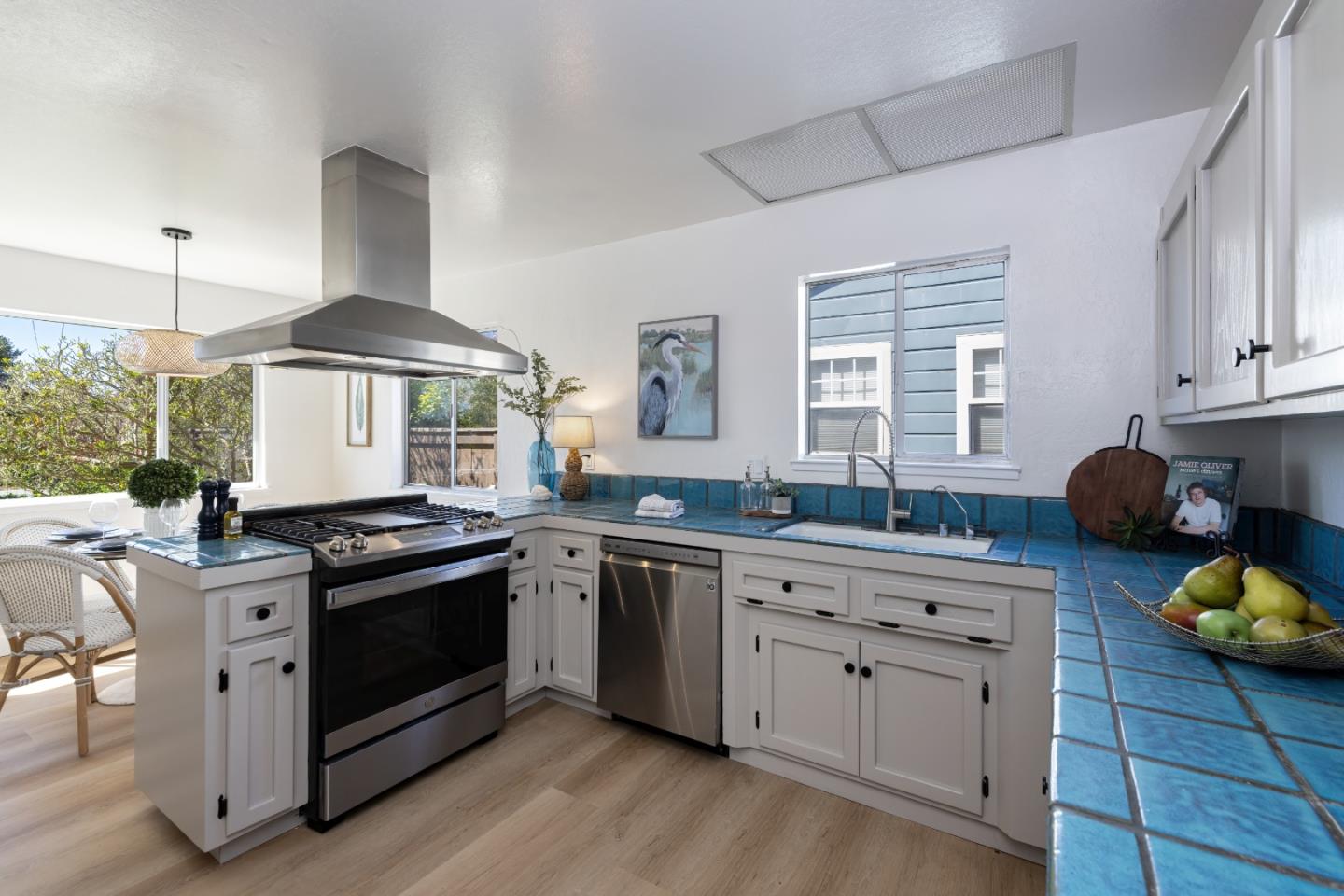 621 Townsend Drive Aptos, CA 95003 - Photo 13 of 43 a kitchen with stainless steel appliances granite countertop a stove and a sink