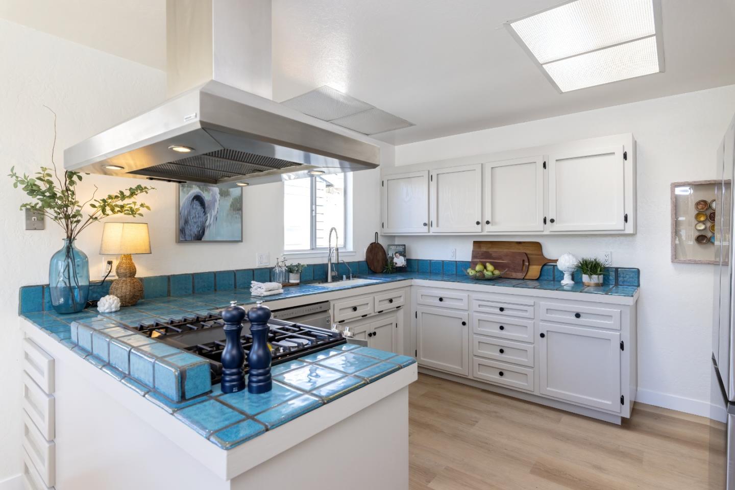 621 Townsend Drive Aptos, CA 95003 - Photo 15 of 43 a kitchen with stainless steel appliances granite countertop a stove and a sink