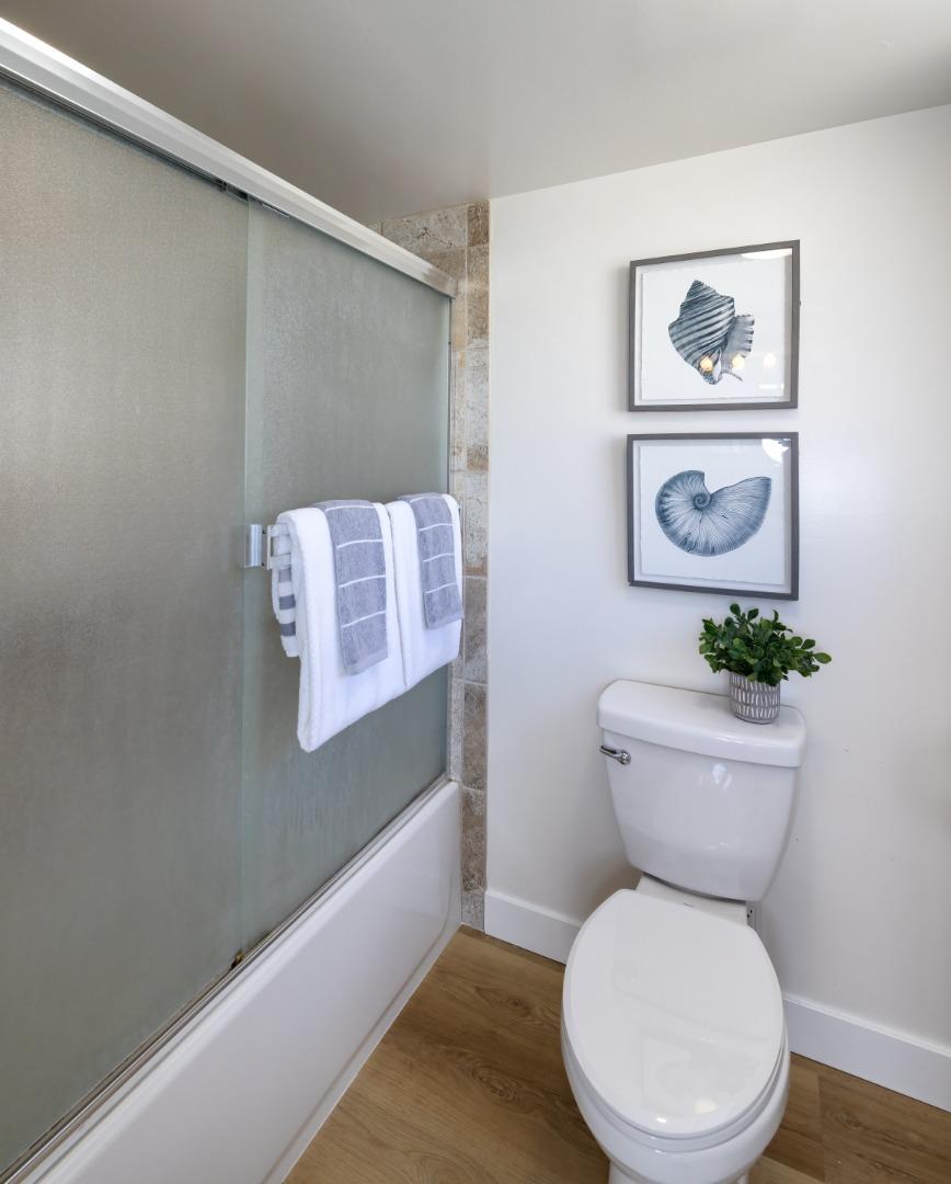 621 Townsend Drive Aptos, CA 95003 - Photo 19 of 43 a white toilet sitting next to a bathroom sink