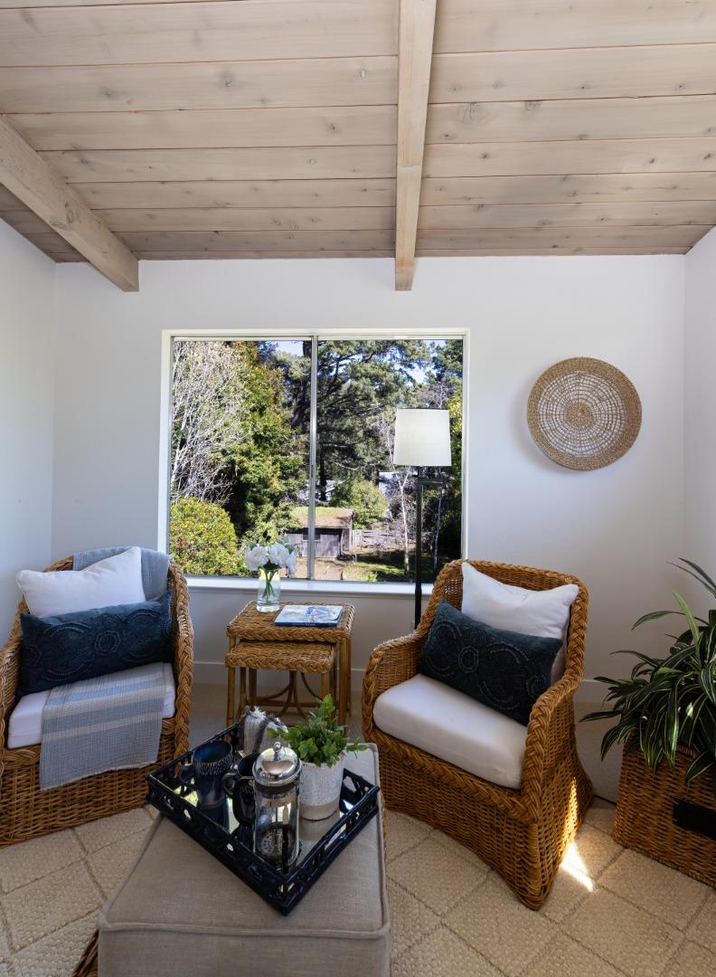 621 Townsend Drive Aptos, CA 95003 - Photo 22 of 43 a living room with furniture and a floor to ceiling window