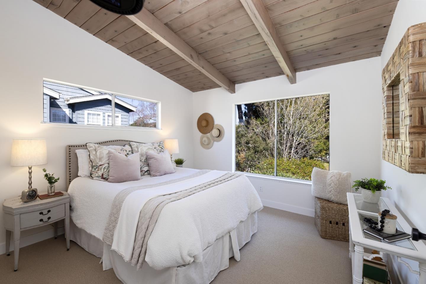 621 Townsend Drive Aptos, CA 95003 - Photo 23 of 43 a bedroom with a bed and a chandelier