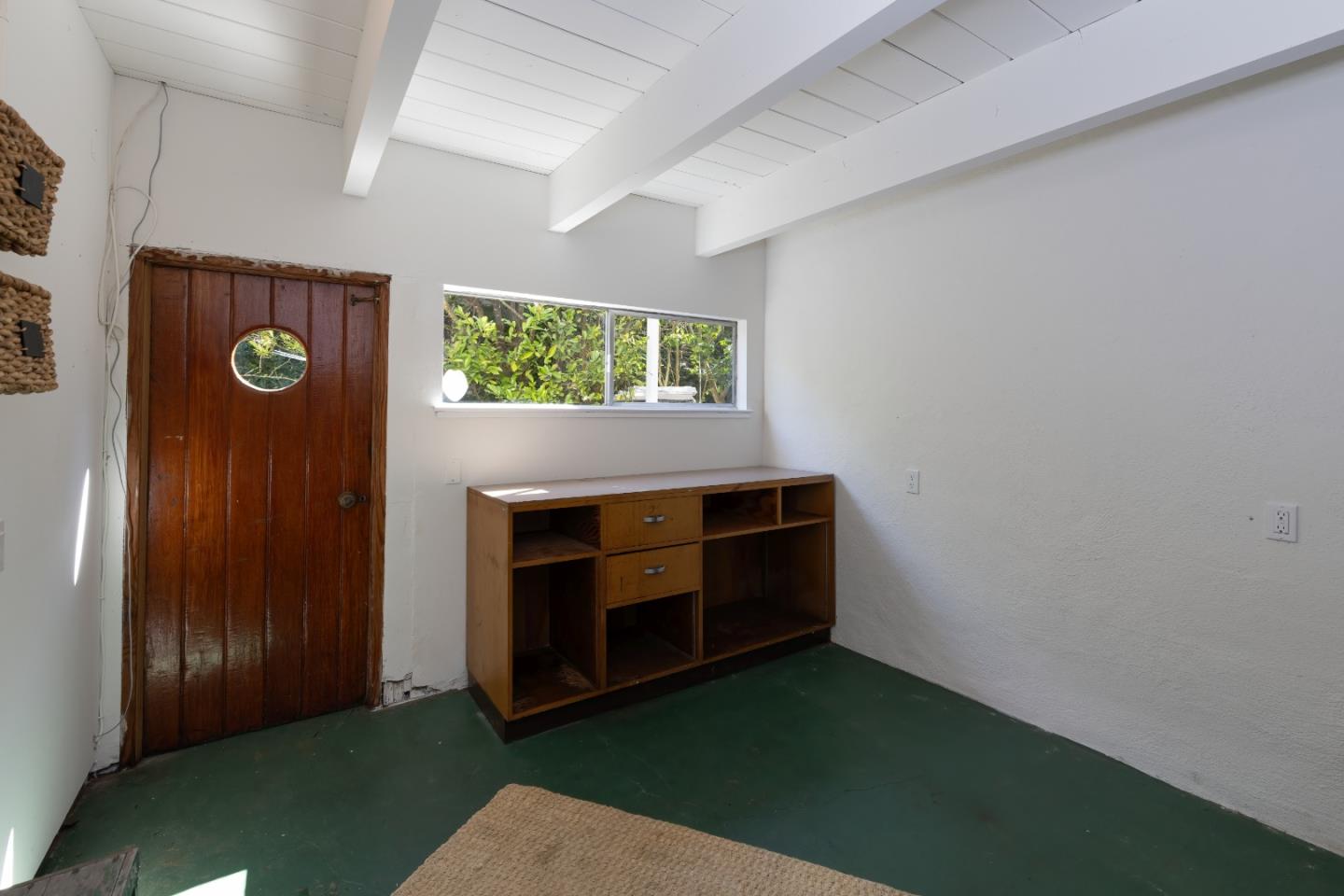 621 Townsend Drive Aptos, CA 95003 - Photo 26 of 43 a living room with furniture and a fireplace