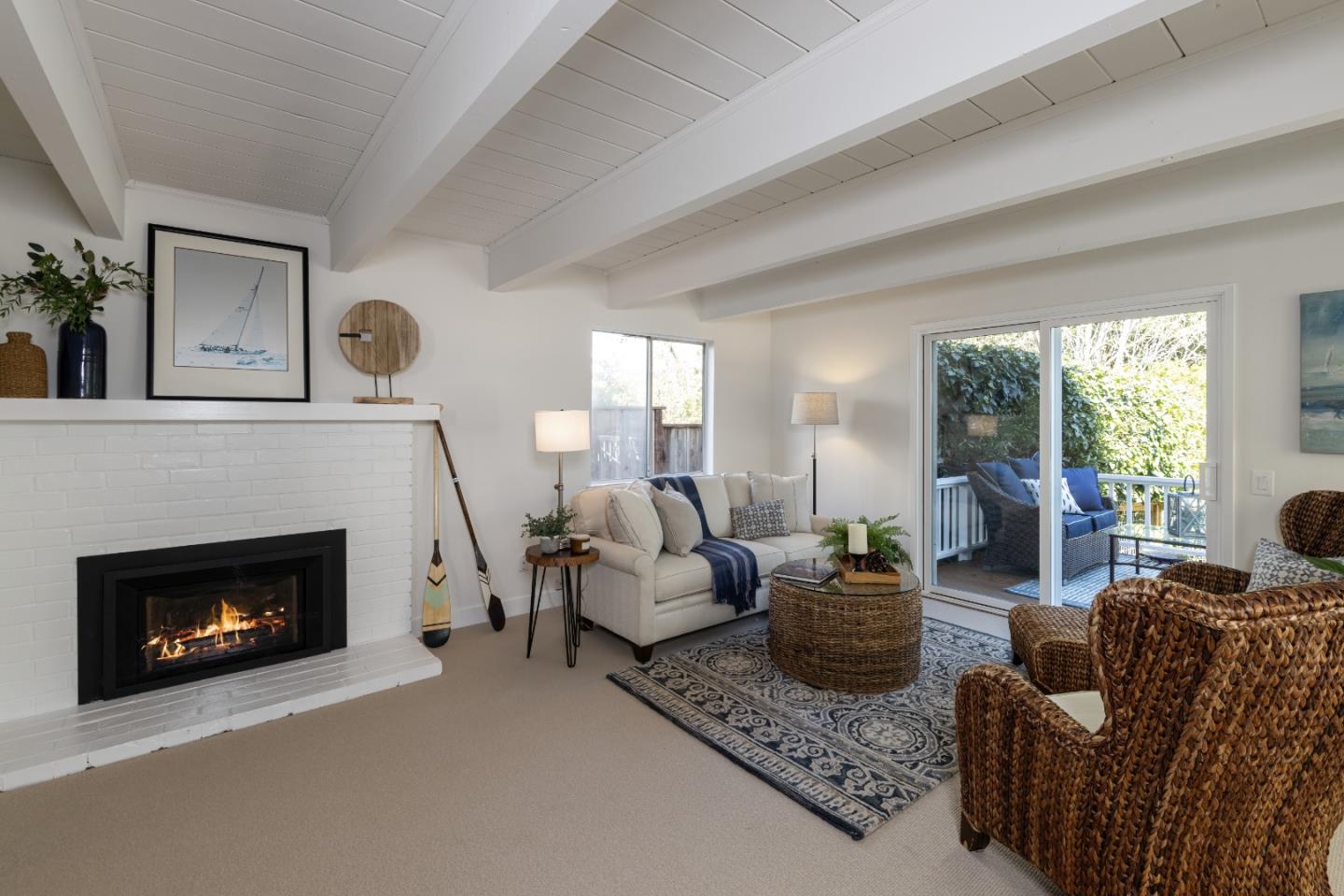 621 Townsend Drive Aptos, CA 95003 - Photo 28 of 43 a living room with furniture a fireplace a window and potted plant