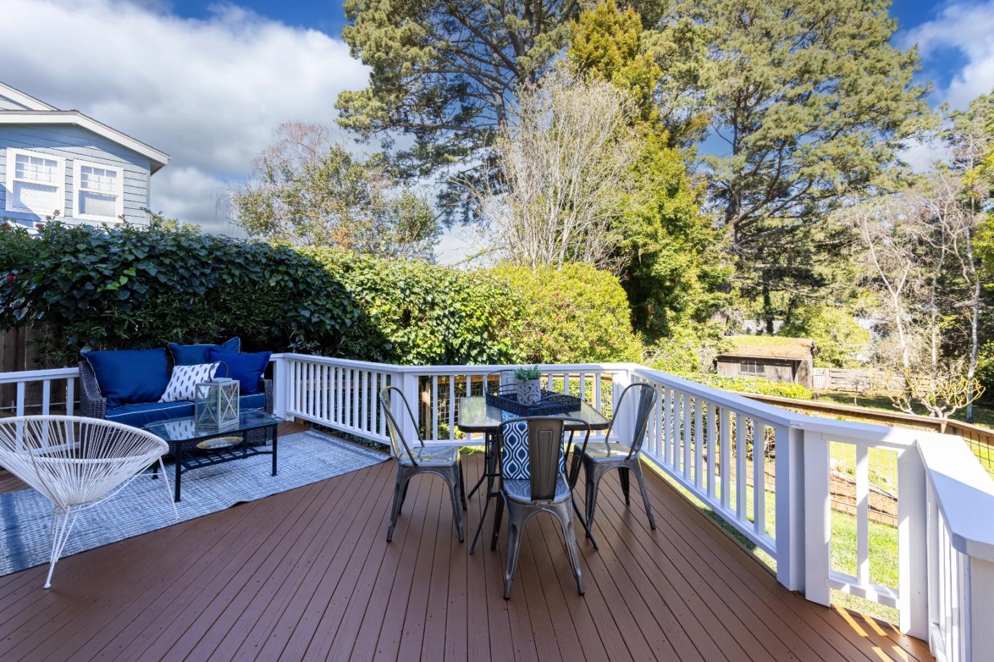 621 Townsend Drive Aptos, CA 95003 - Photo 30 of 43 a view of a chairs and table on the wooden floor