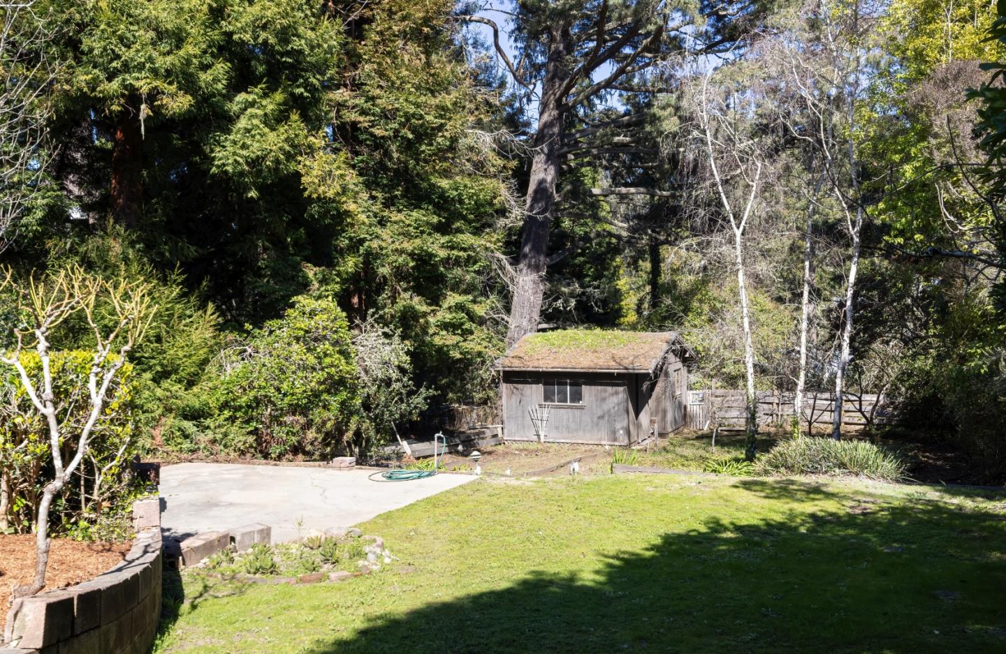 621 Townsend Drive Aptos, CA 95003 - Photo 32 of 43 a view of a house with swimming pool and a yard