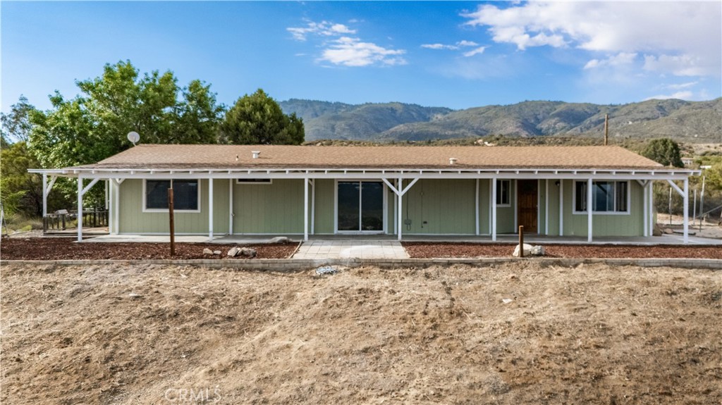 56515 Dickson Way Anza, CA 92539 - Photo 1 of 17 front view of a house with a yard