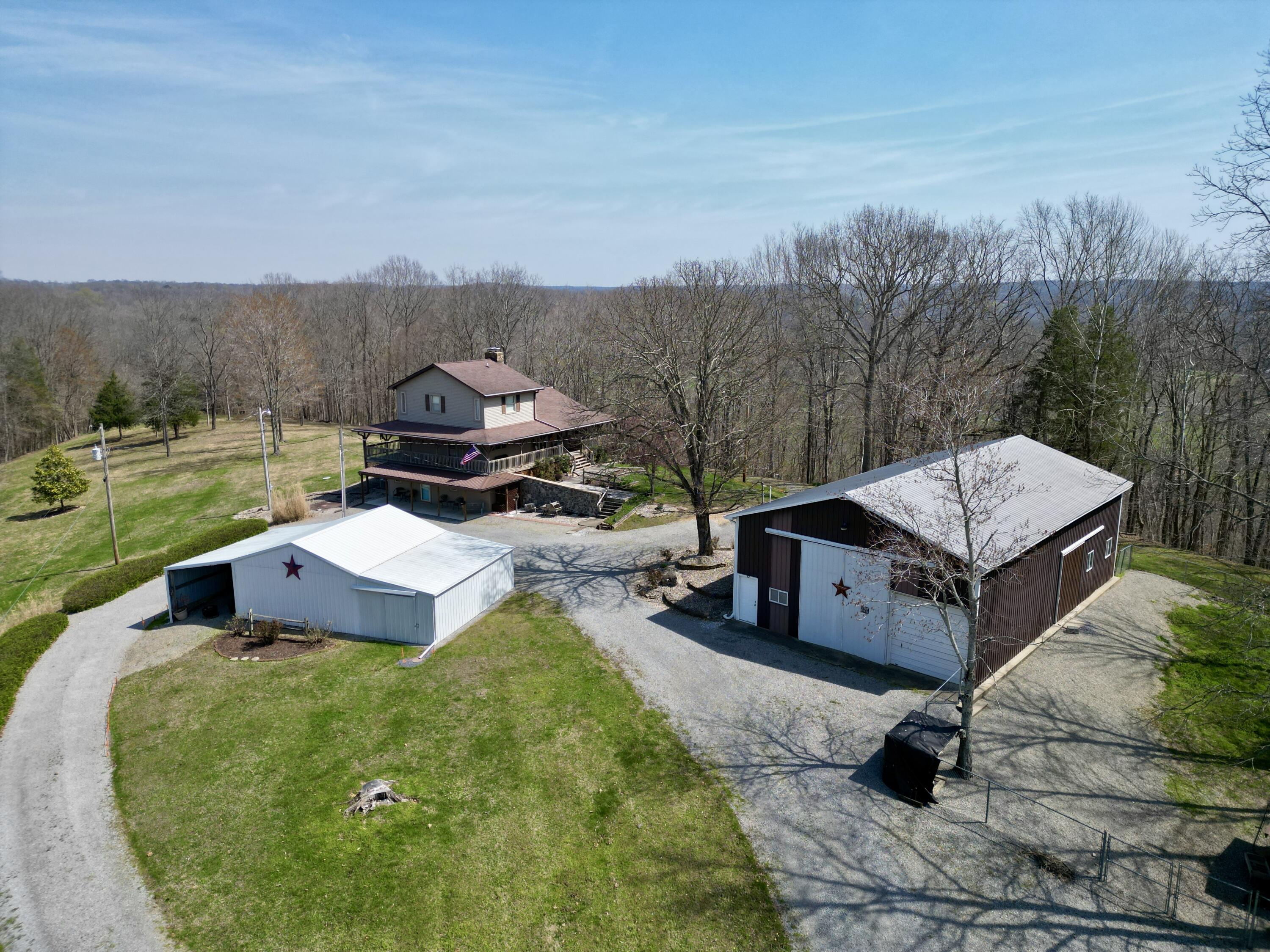 400 D D Wilson Road Knifley, KY 42753 - Photo 1 of 106 dji_fly_20260323_073142_541_177557141631