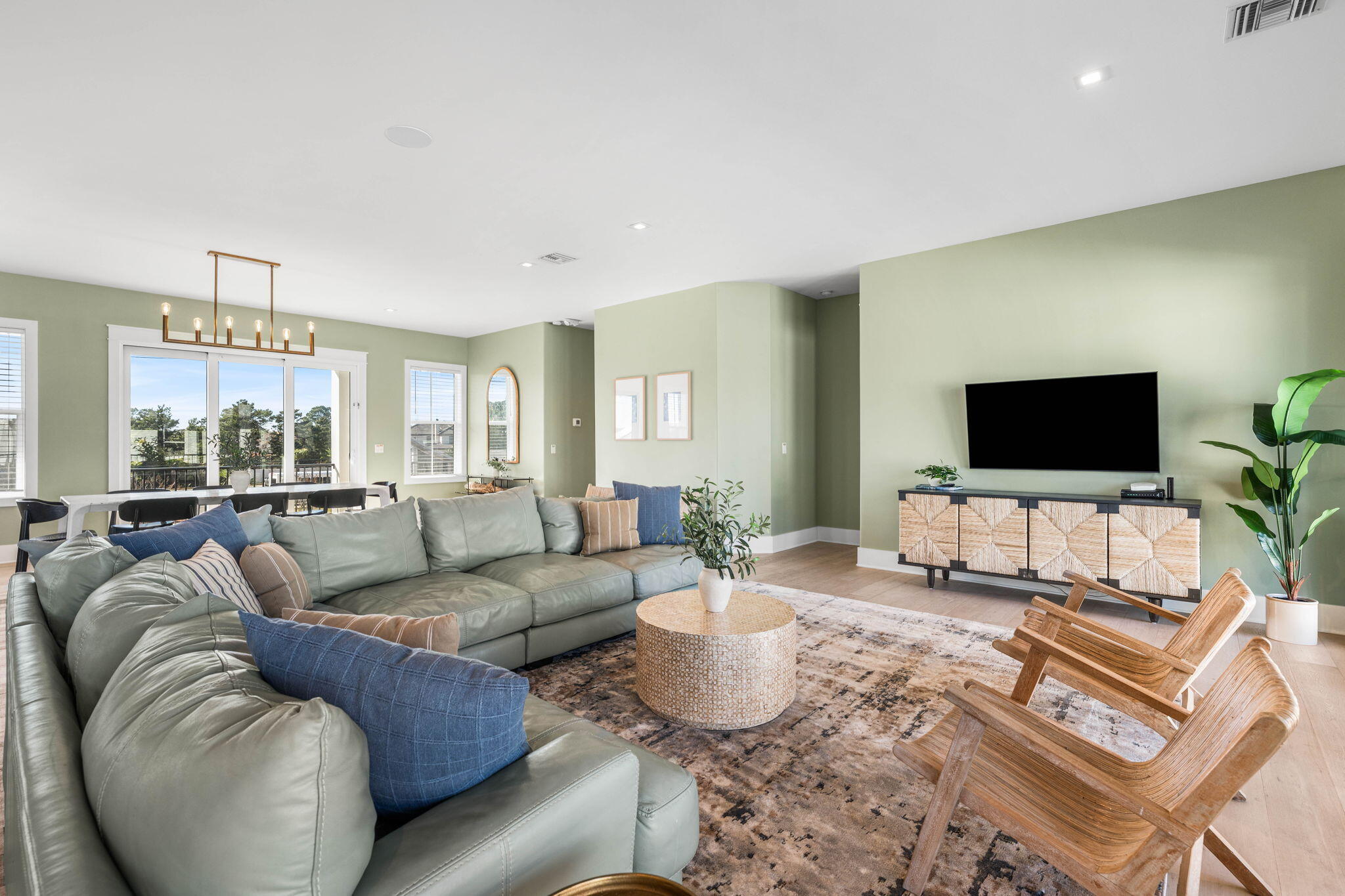 1683 South Co Highway 393 Santa Rosa Beach, FL 32459 - Photo 29 of 72 a living room with furniture and a flat screen tv