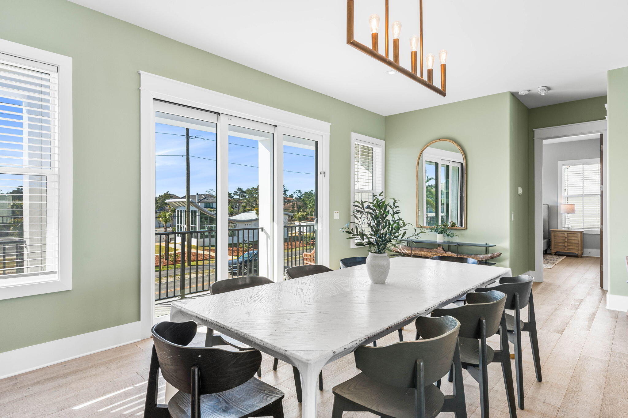 1683 South Co Highway 393 Santa Rosa Beach, FL 32459 - Photo 31 of 72 a view of a dining room with furniture window and wooden floor
