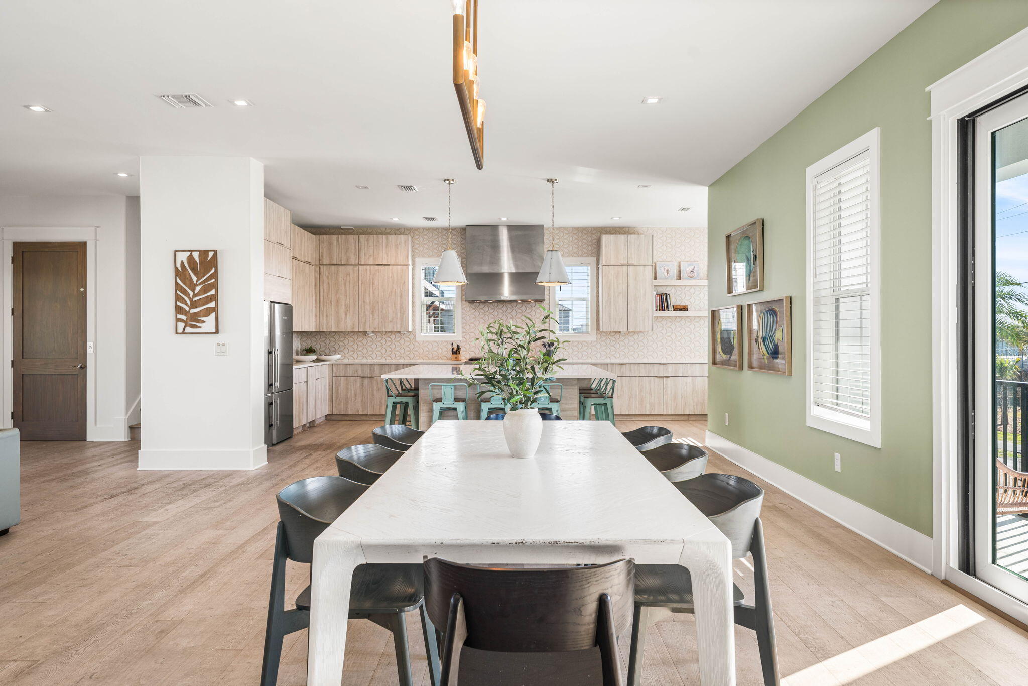 1683 South Co Highway 393 Santa Rosa Beach, FL 32459 - Photo 34 of 72 a view of a dining room with furniture and wooden floor