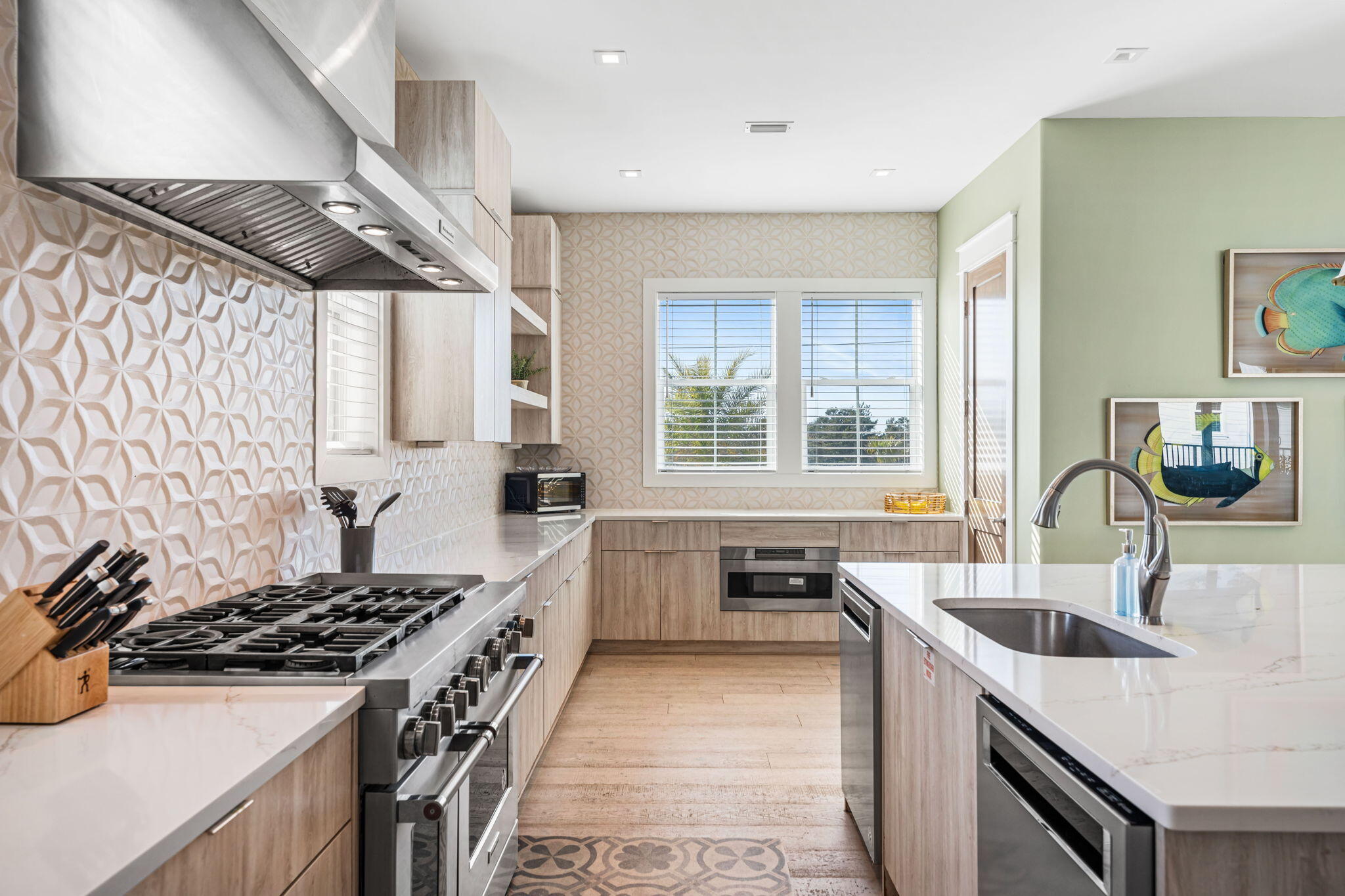 1683 South Co Highway 393 Santa Rosa Beach, FL 32459 - Photo 37 of 72 a kitchen with a sink stove top oven and cabinets