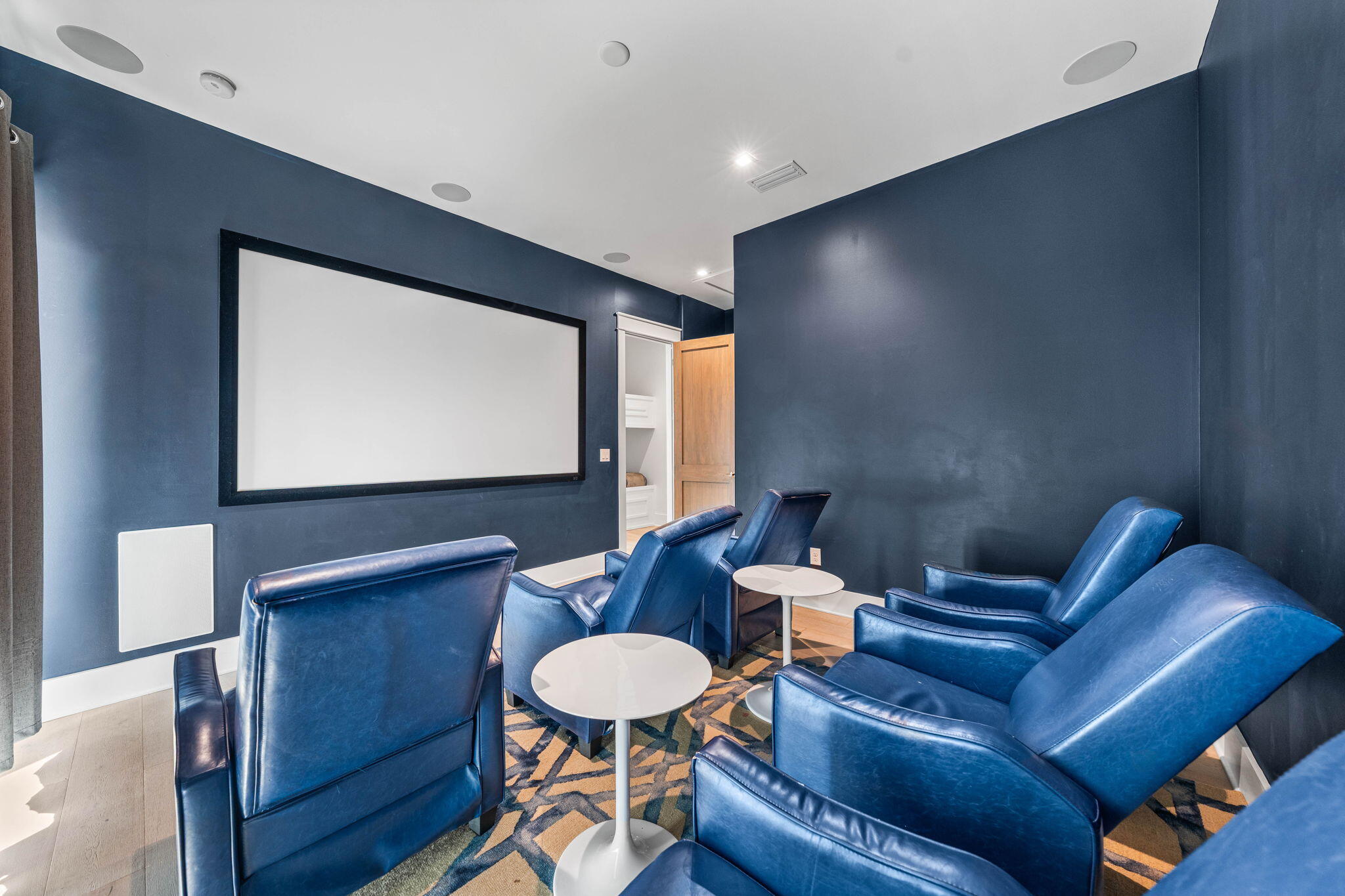 1683 South Co Highway 393 Santa Rosa Beach, FL 32459 - Photo 60 of 72 a room with furniture and a projector screen