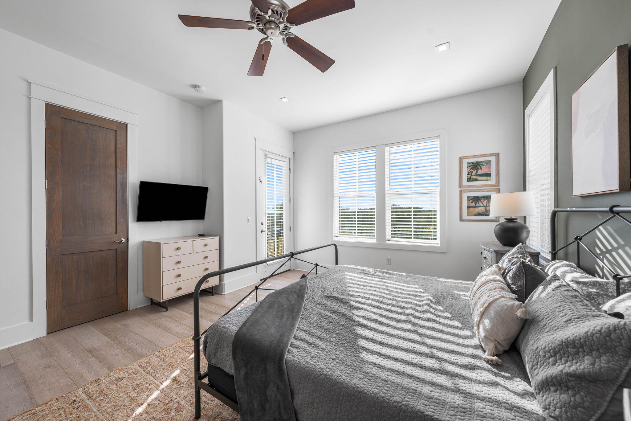 1683 South Co Highway 393 Santa Rosa Beach, FL 32459 - Photo 62 of 72 a bedroom with a bed and a flat screen tv