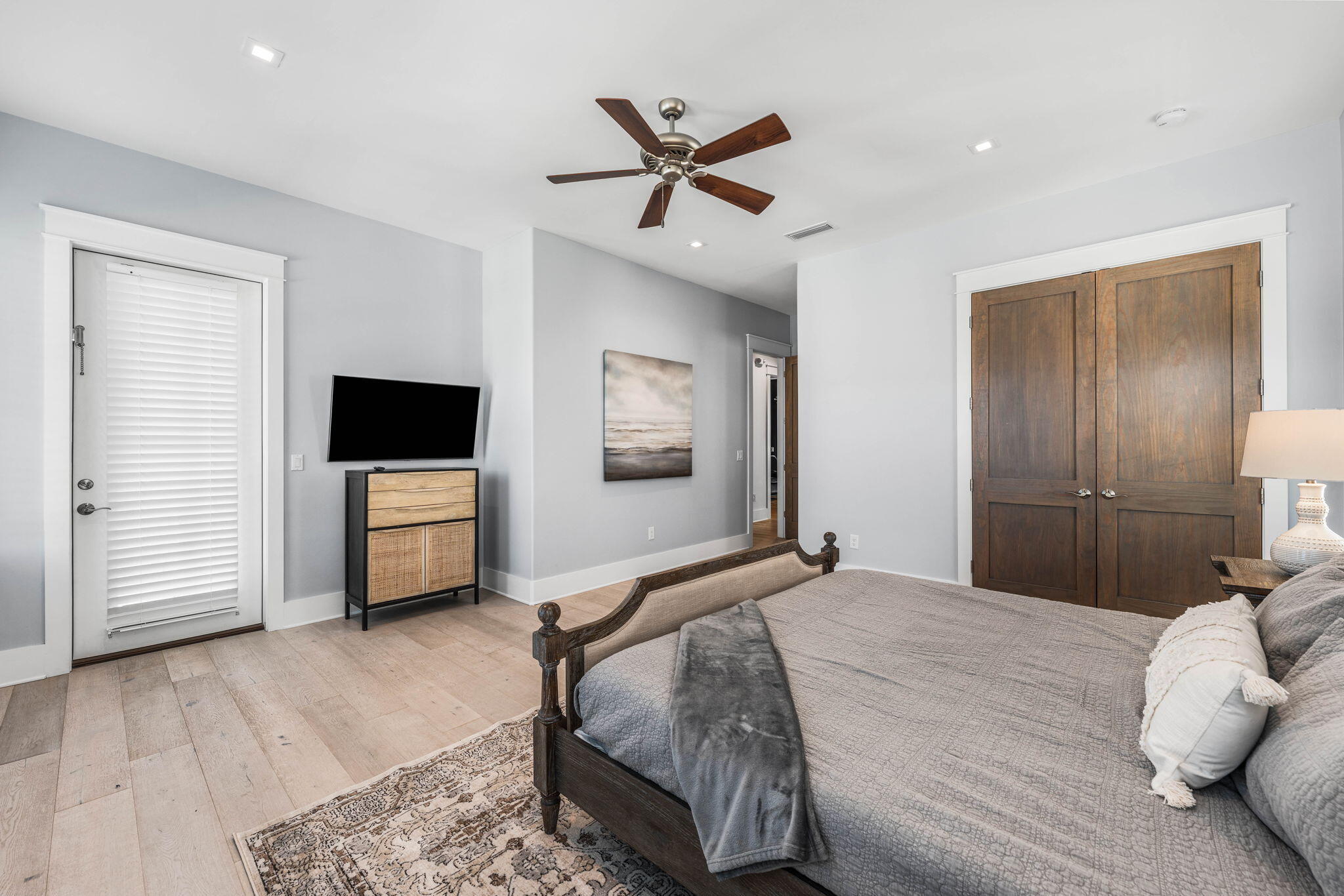 1683 South Co Highway 393 Santa Rosa Beach, FL 32459 - Photo 70 of 72 a bedroom with a bed and a ceiling fan