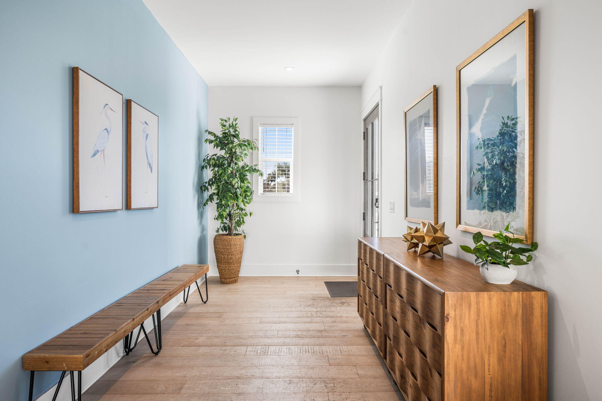 1683 South Co Highway 393 Santa Rosa Beach, FL 32459 - Photo 8 of 72 a living room with furniture and a potted plant