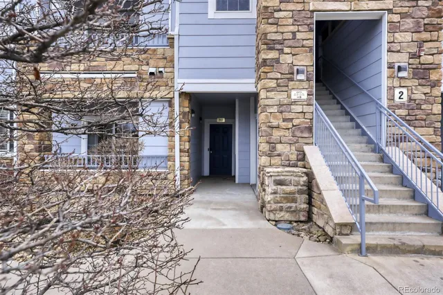 a view of entryway with brick walls