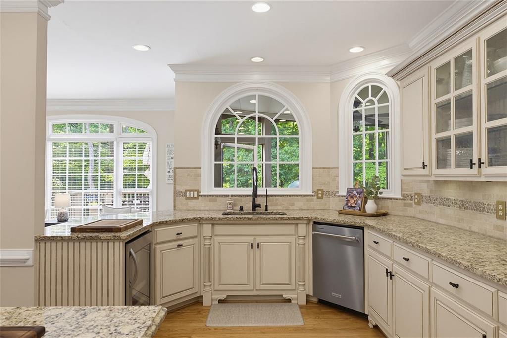 14442 Club Circle Milton, GA 30004 - Photo 6 of 82 a kitchen with a sink and large window