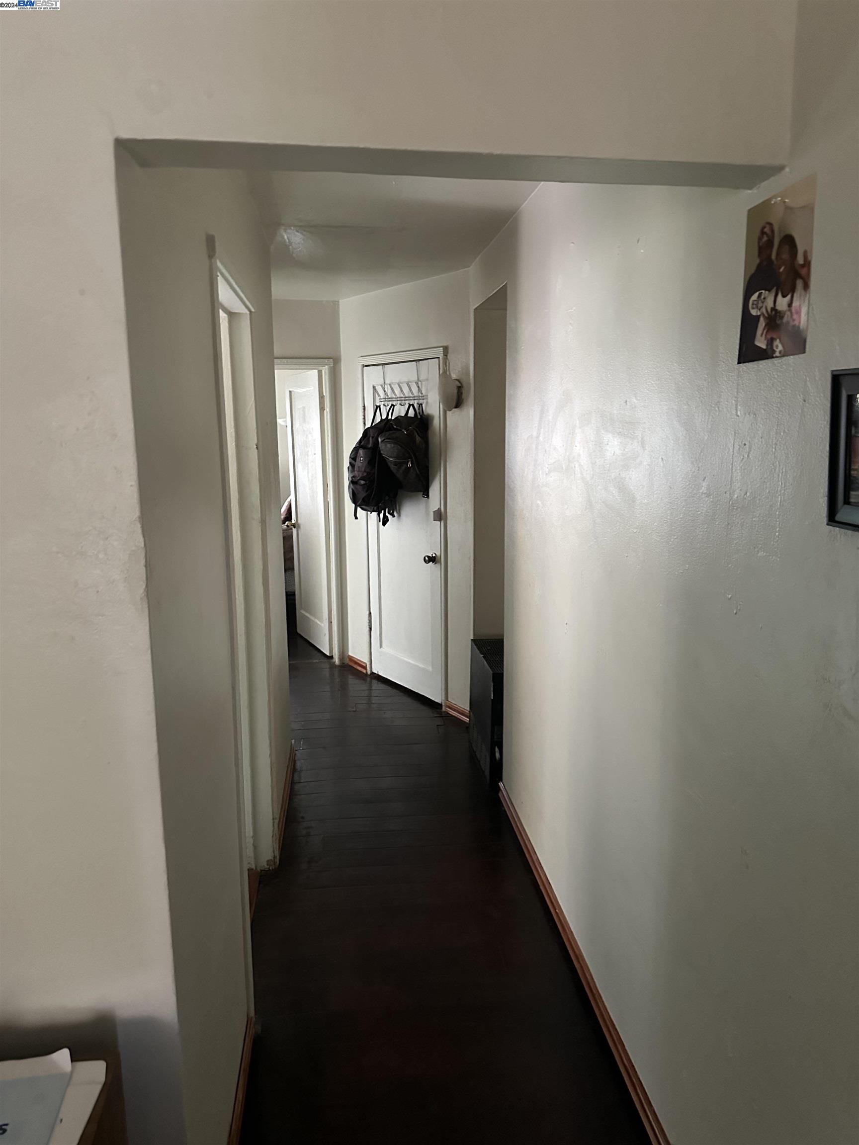 5659 Telegraph Avenue Oakland, CA 94609 - Photo 15 of 42 a view of hallway with wooden floor
