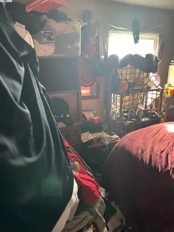 a white toilet sitting next to a shower