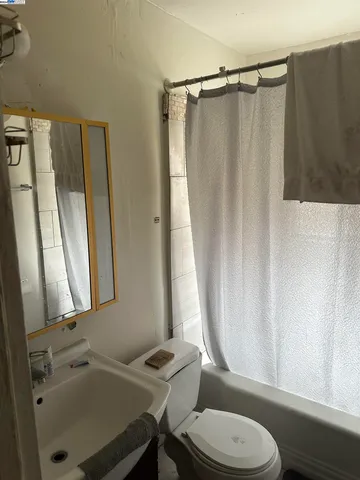 a room with furniture and a flat screen tv